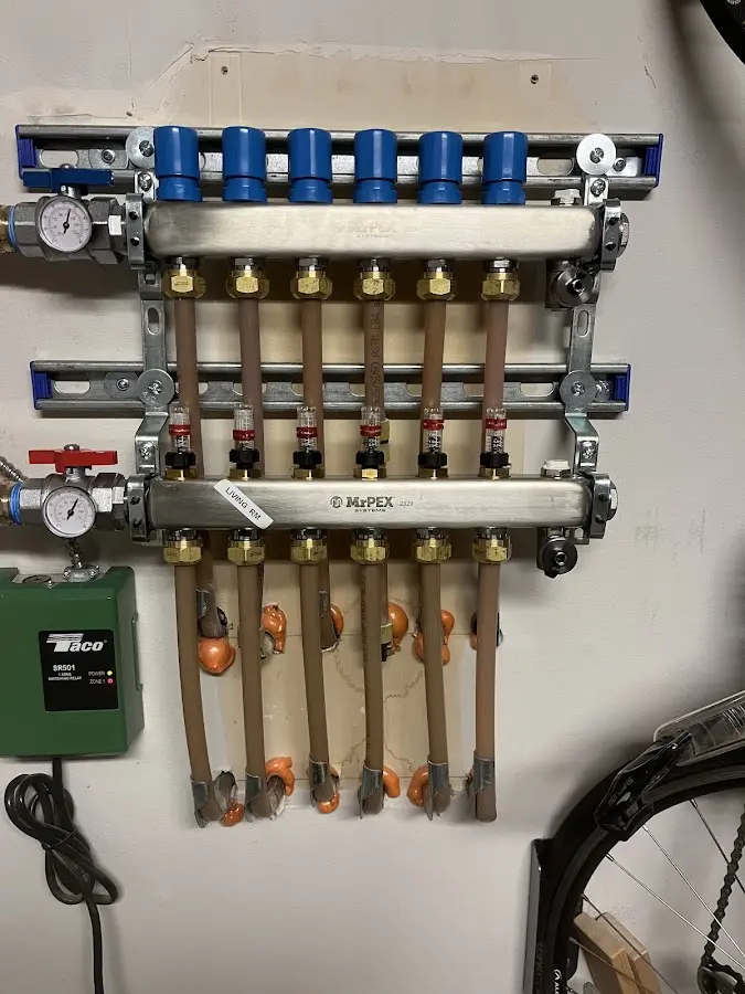 Plumber performing Gas Line Installation at a residential property in Richmond